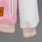 Pink ribbed sleeve hem with white-striped cuffs