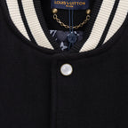 Striped varsity collar with hanging charms and round white snap button