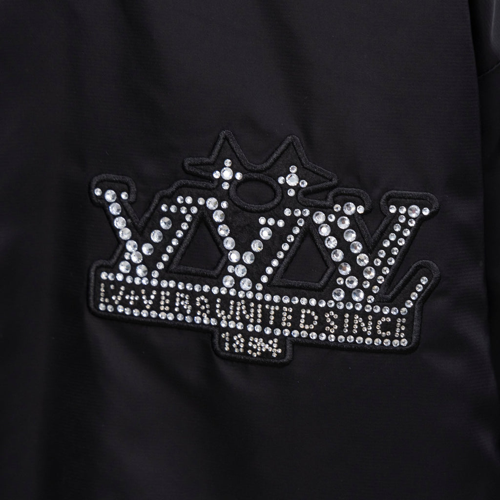 Louis Vuitton jacket front with large rhinestone crown logo