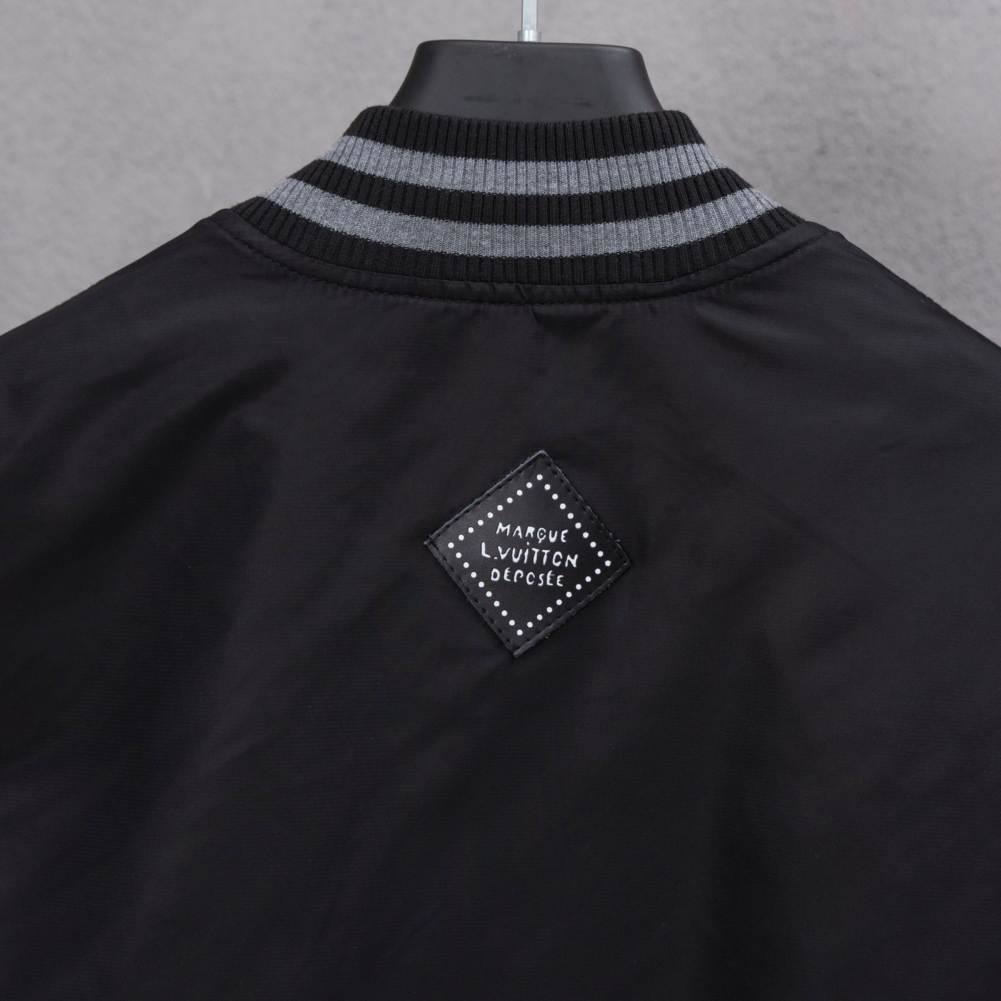 Louis Vuitton bomber jacket back with striped ribbed collar and logo patch