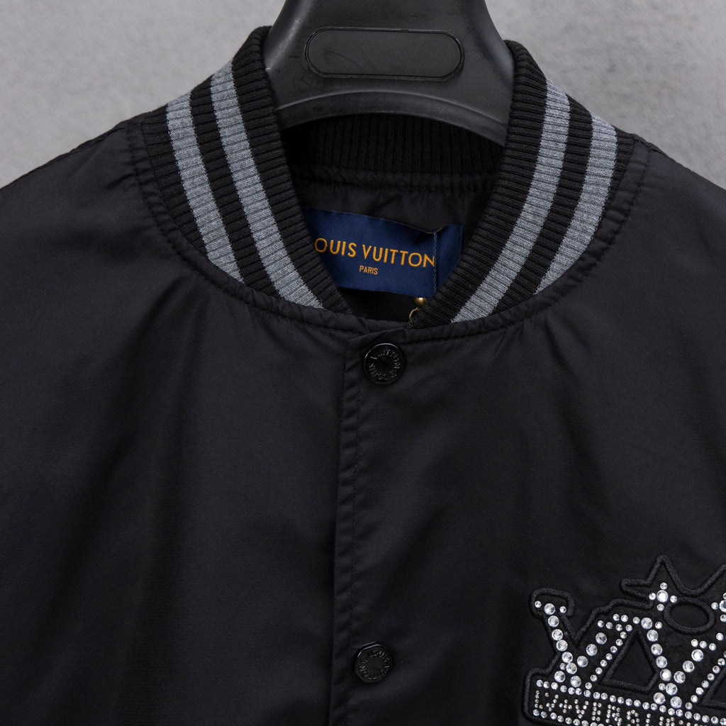 Louis Vuitton bomber jacket neckline with striped rib trim and button closure