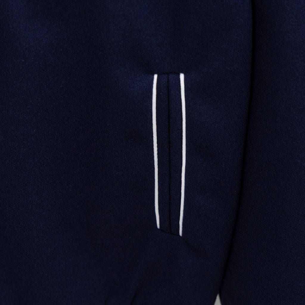 Dark navy jacket side pocket with white stripe detail