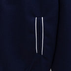 Dark navy jacket side pocket with white stripe detail