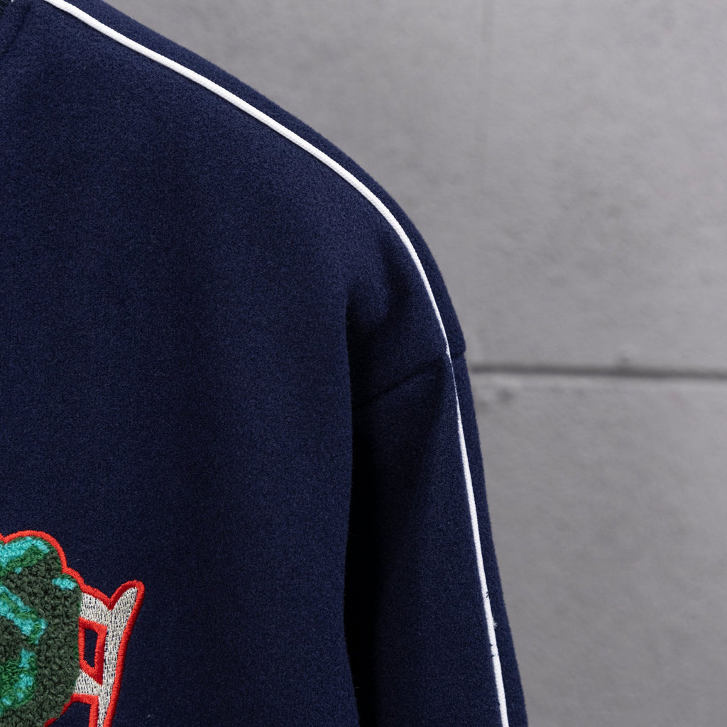 Dark navy jacket sleeve with white side stripe trim