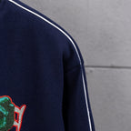 Dark navy jacket sleeve with white side stripe trim