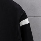 Givenchy button-up jacket sleeve detail, black with white striped rib cuff