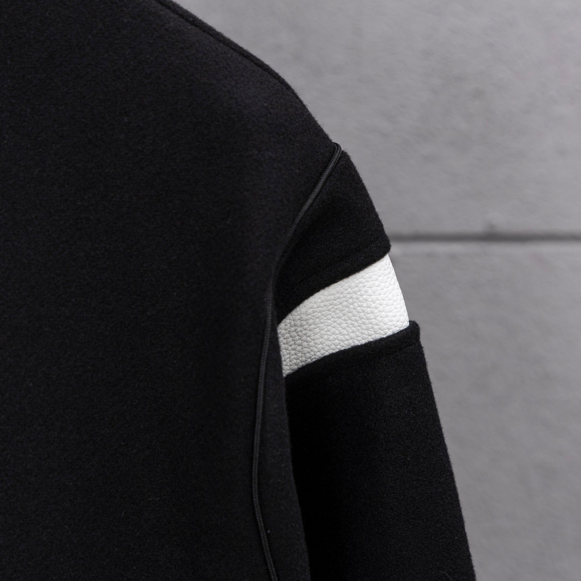 Givenchy button-up jacket sleeve detail, black with white striped rib cuff