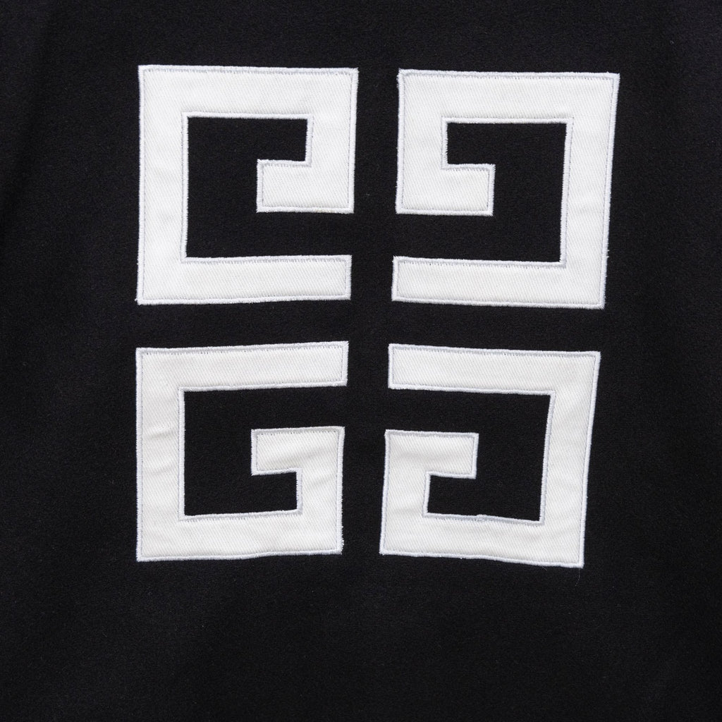Givenchy button-up jacket front emblem, white geometric squares on black