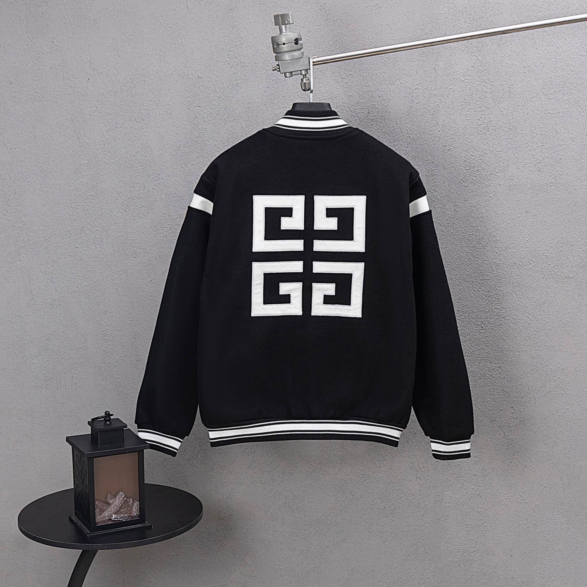 Givenchy button-up jacket, black back with white geometric emblem and striped hem