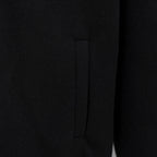 Givenchy button-up jacket side panel, black knit with stitched seam