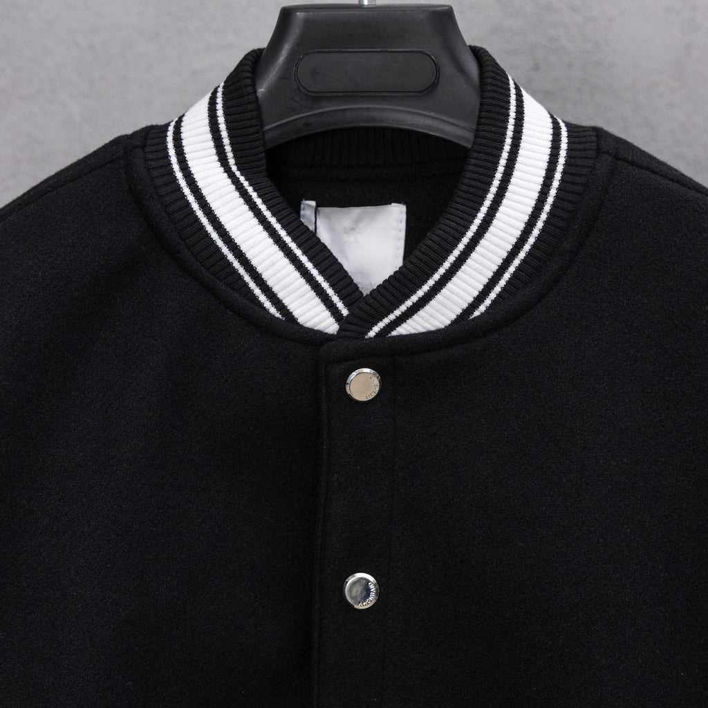 Givenchy button-up jacket neckline, black knit with white striped collar and two-button front