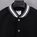 Givenchy button-up jacket neckline, black knit with white striped collar and two-button front