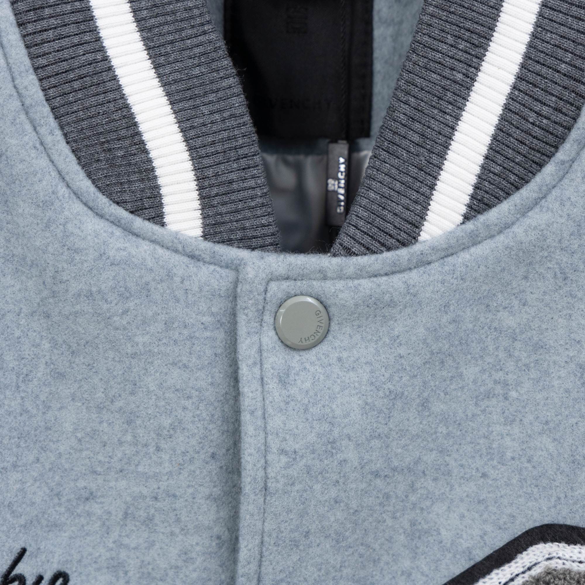 Givenchy light-blue varsity jacket front, snap button and ribbed stripe collar