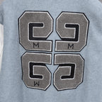 Givenchy varsity jacket front patch with large letter graphic and black-outline stitching