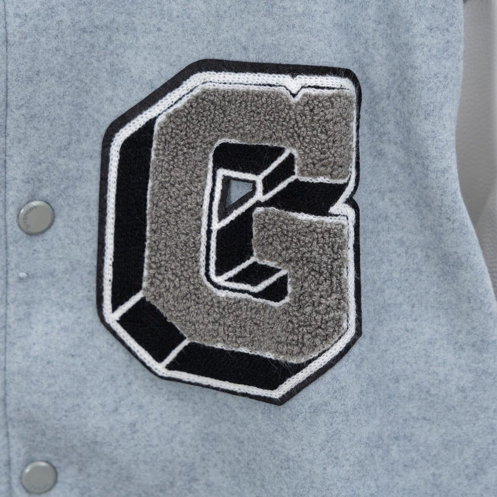 Givenchy varsity jacket front badge patch with C-like letter, black outline applique