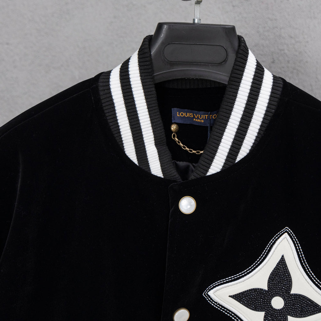 Black button-up shirt with striped placket collar and Louis Vuitton patch