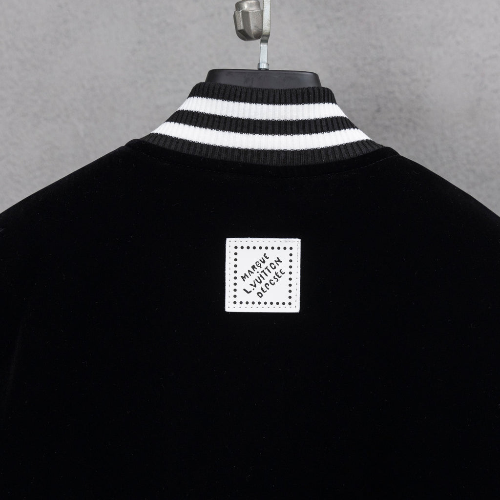 Black jacket with ribbed striped collar and square Louis Vuitton back label