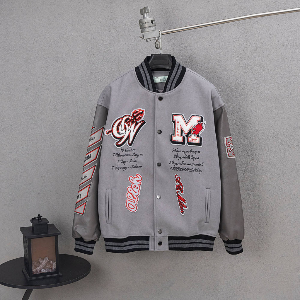 Off White varsity jacket, light gray with snap front, black striped cuffs, red graphic patches