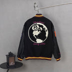 Black varsity jacket with globe back graphic and ribbed striped collar and cuffs