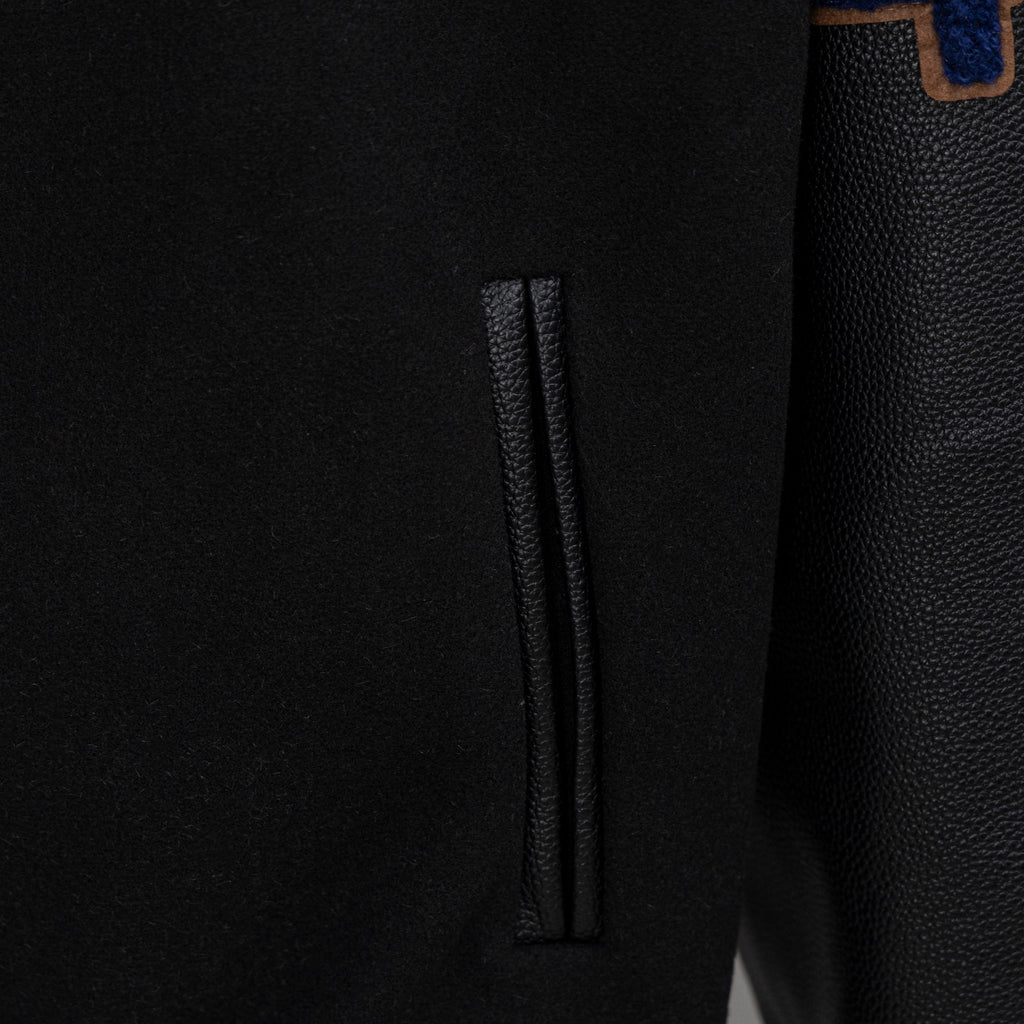 Black jacket side pocket opening detail