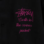 Black varsity jacket front with pink “Earth in the corner pocket” embroidery