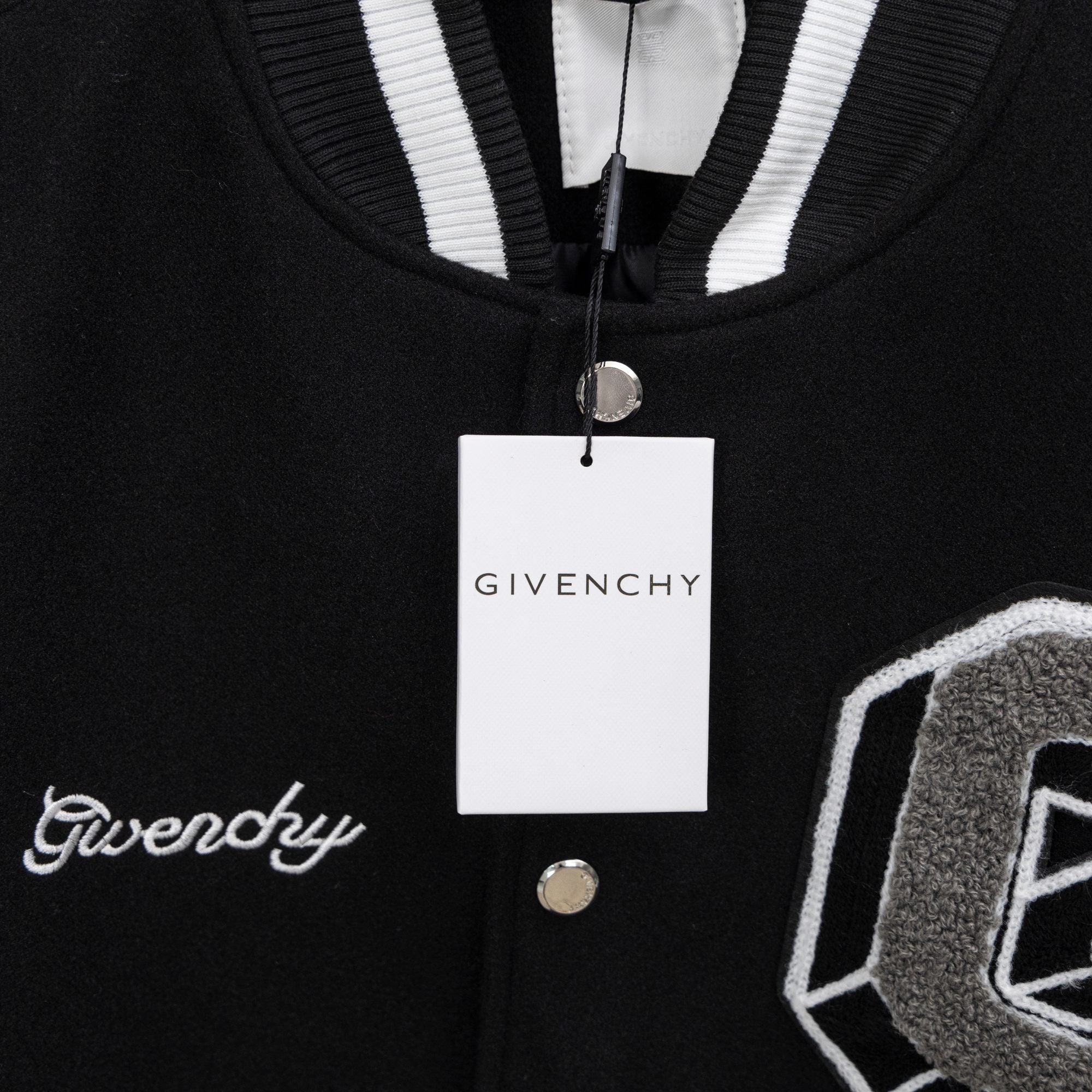 Givenchy knit collar button-up jacket with white-and-black striped trim and hanging tag