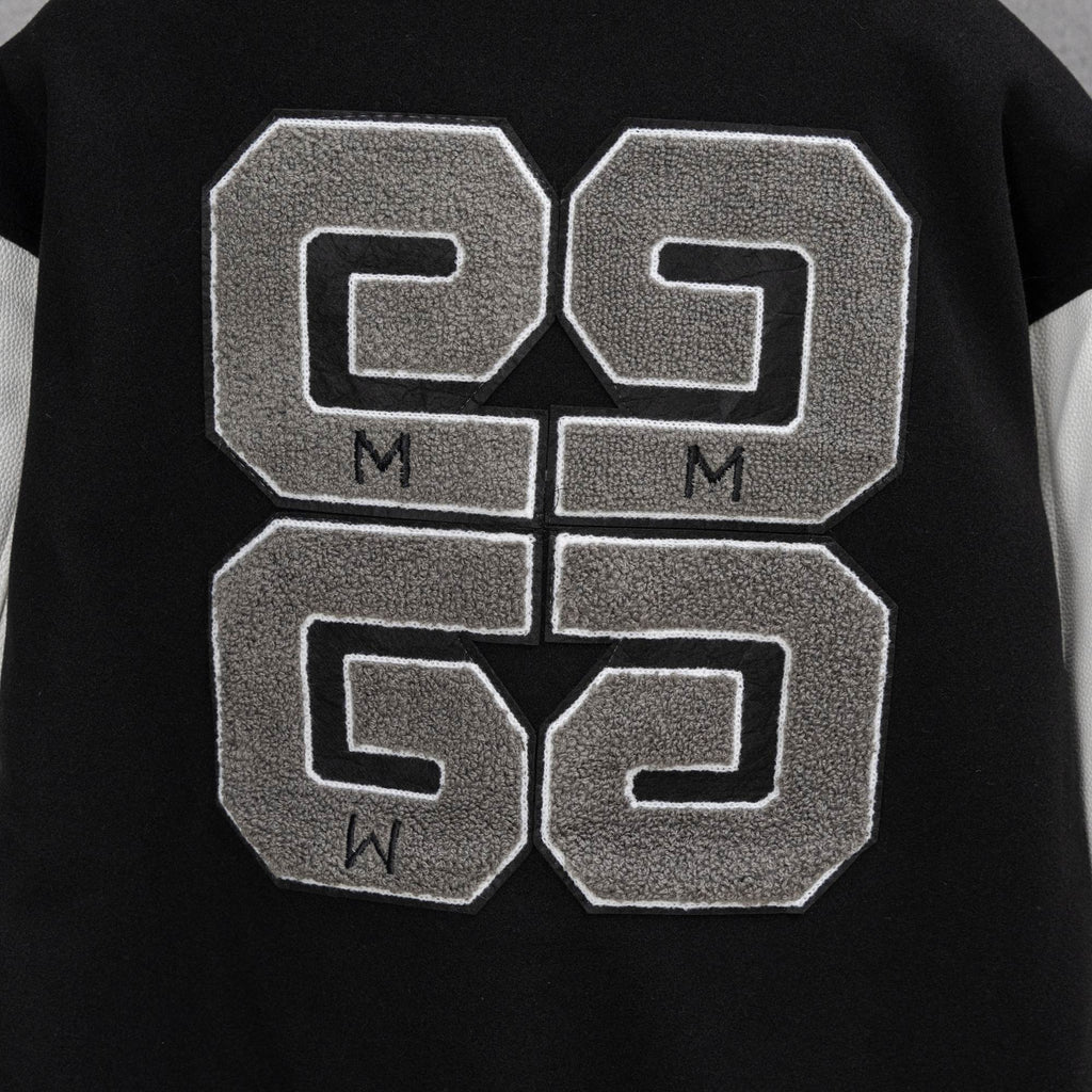 Givenchy jacket front graphic with four large stitched blocks in gray and white outline
