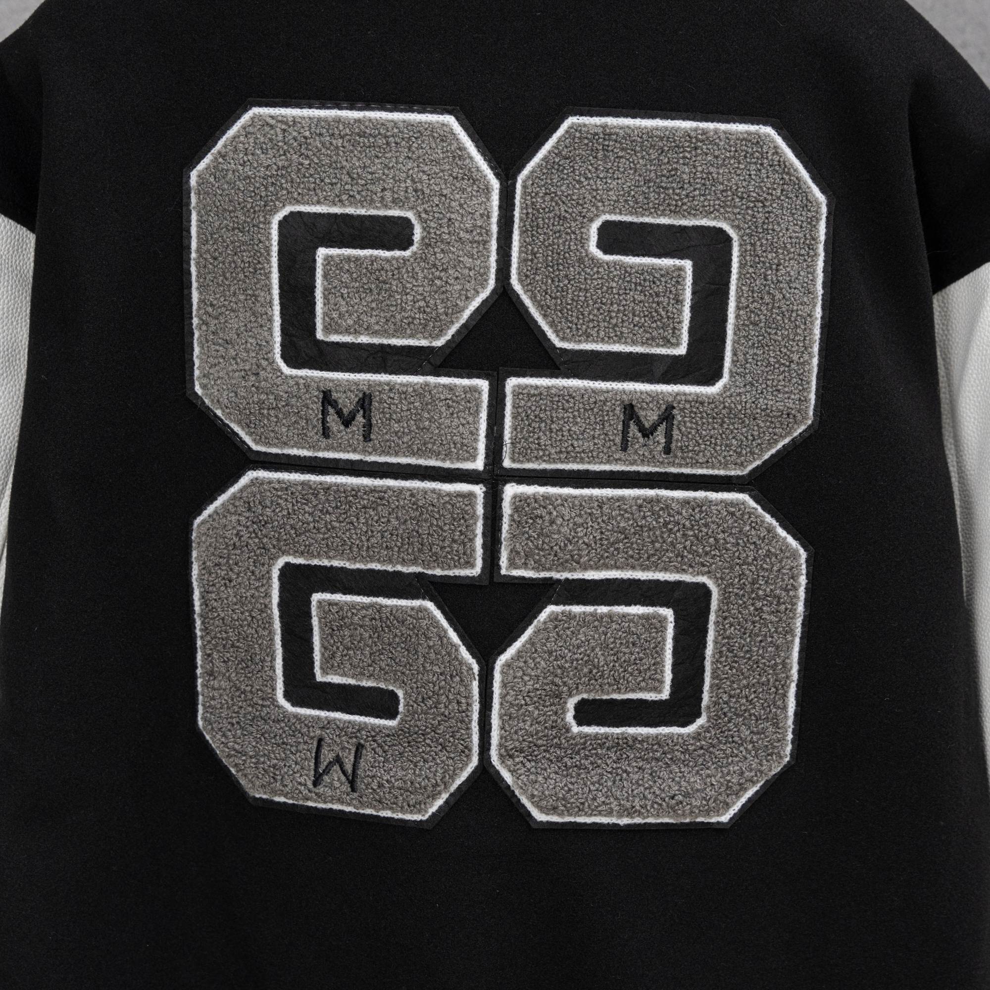 Givenchy jacket front graphic with four large stitched blocks in gray and white outline