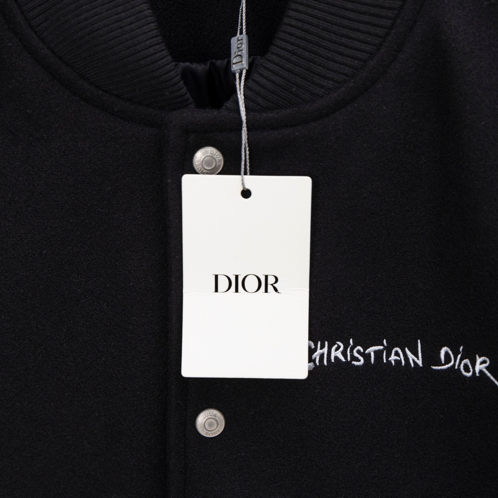 Long jacket collar with DIOR hanging tag and metal snap button