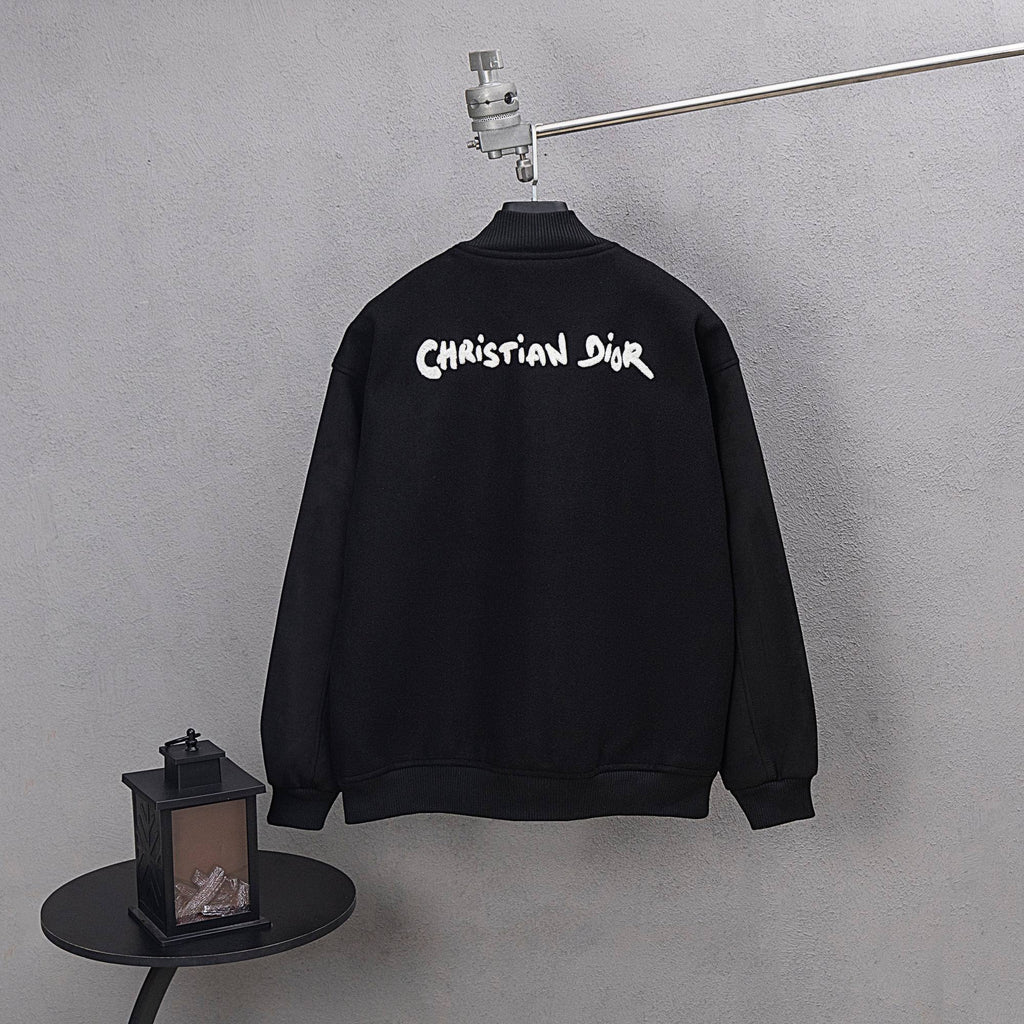 Long jacket with Christian Dior logo on back and ribbed stand collar