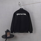 Long jacket with Christian Dior logo on back and ribbed stand collar
