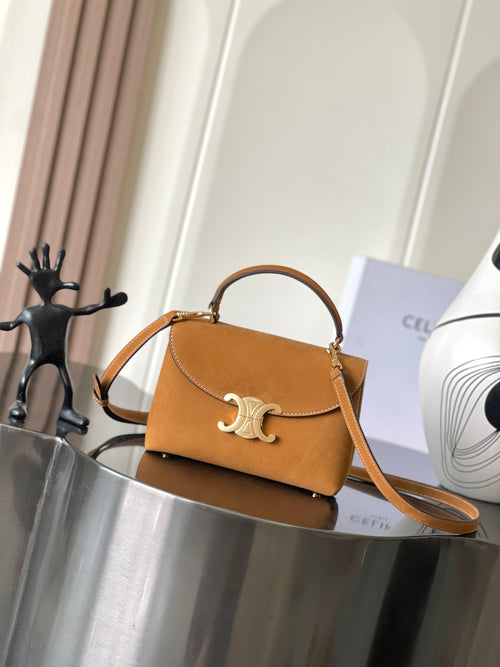 Celine small top-handle bag in tan leather with gold clasp and crossbody strap