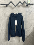Dark navy zip-up hoodie with drawstring hood and full-length front zipper