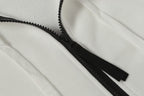 White hooded jacket with black zipper and exposed zipper track detail