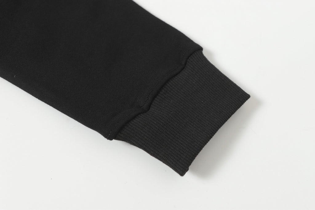 Black ribbed sleeve cuff detail on hooded zip jacket