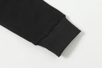 Black ribbed sleeve cuff detail on hooded zip jacket