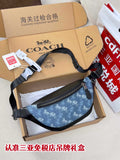 Coah crossbody bag, dark blue patterned with black strap and zip front pocket