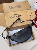 Coah crossbody belt bag, smooth black leather style with adjustable shoulder strap
