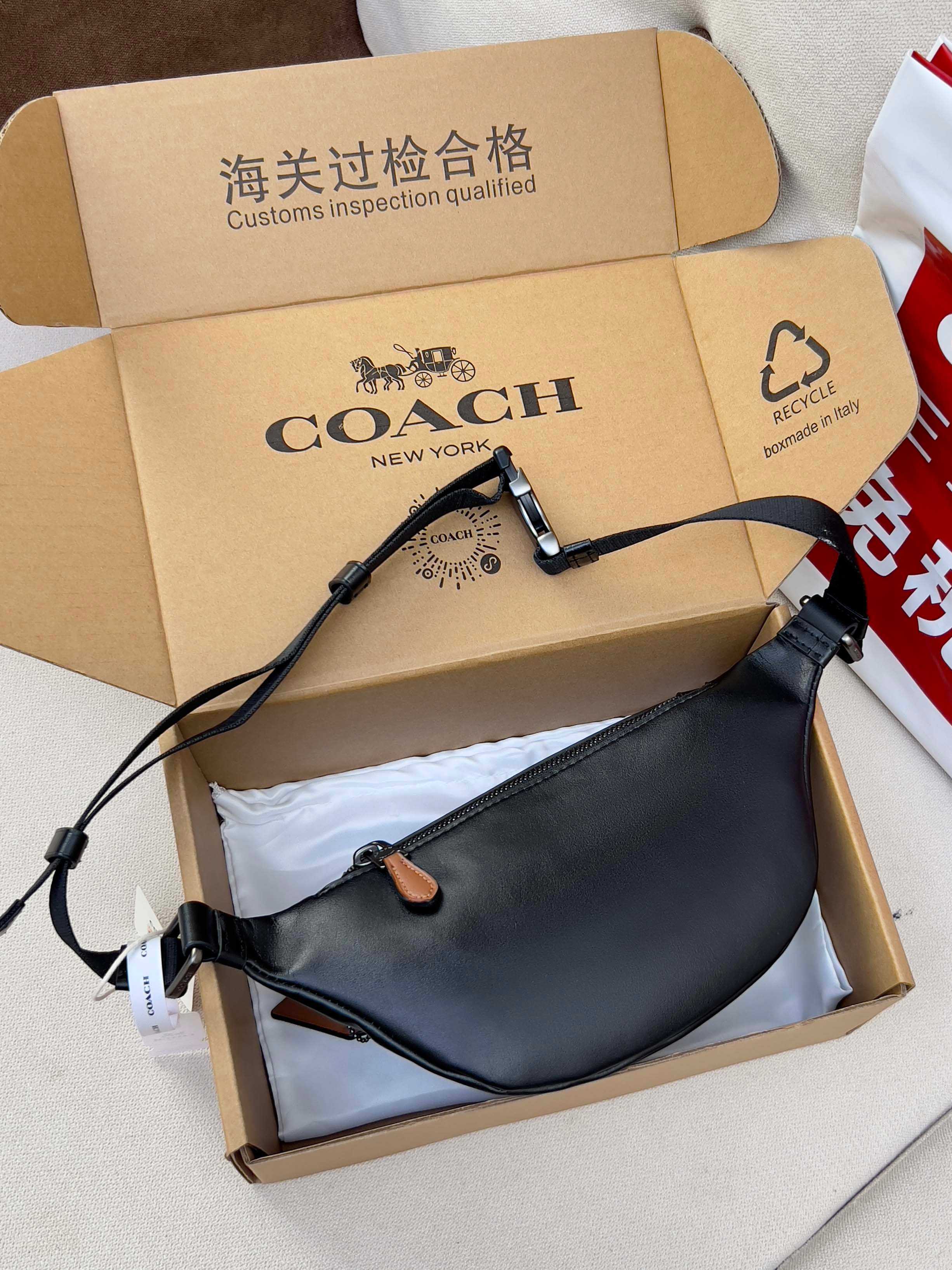 Coah crossbody belt bag, smooth black leather style with adjustable shoulder strap