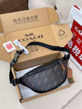 Coah crossbody waist bag, dark patterned fabric with zip pocket and adjustable strap