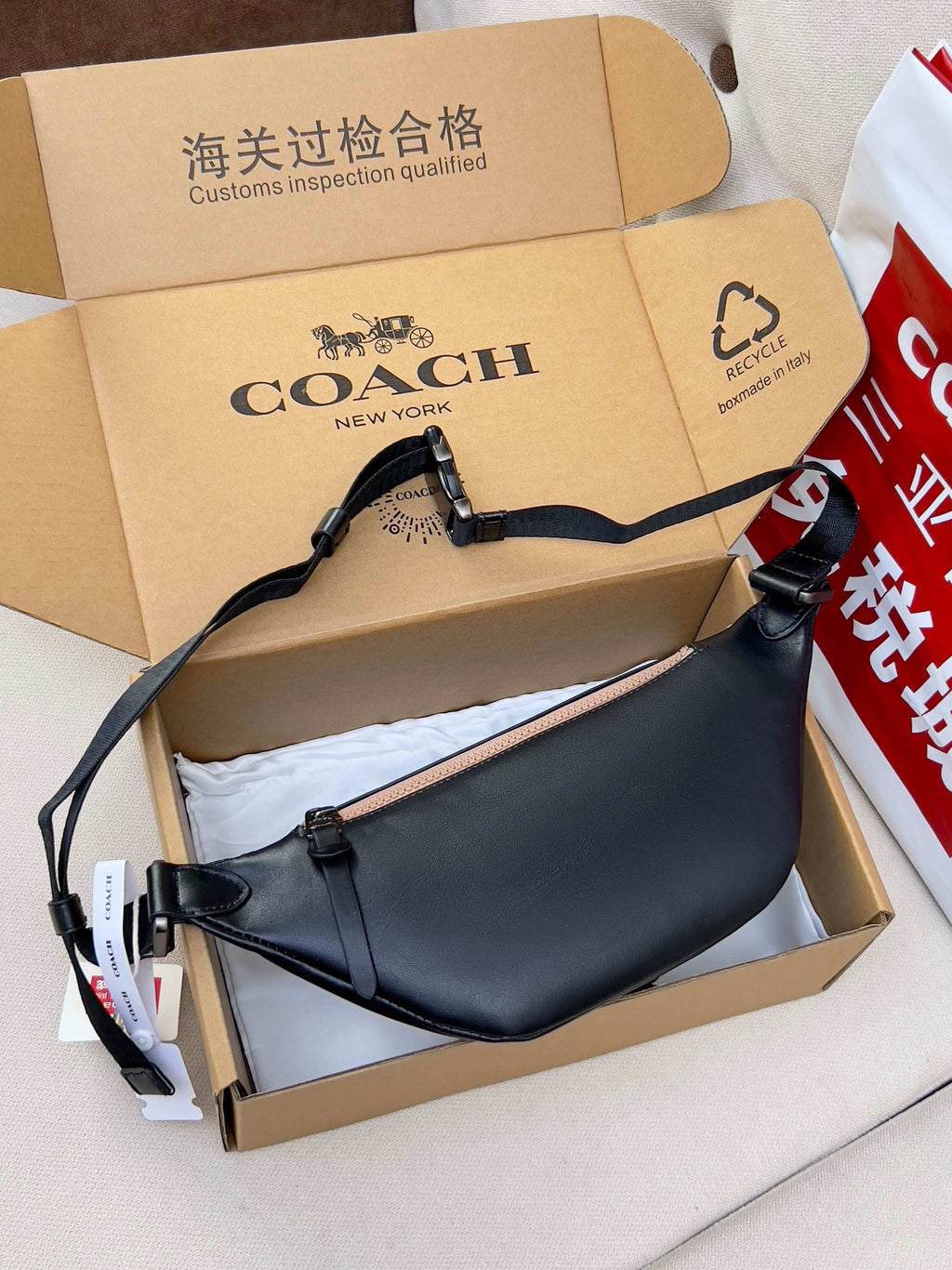 Coah smooth dark waist bag with adjustable strap and zip pocket