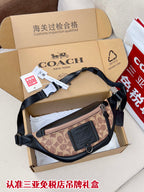 Coah monogram waist bag with black trim and adjustable strap