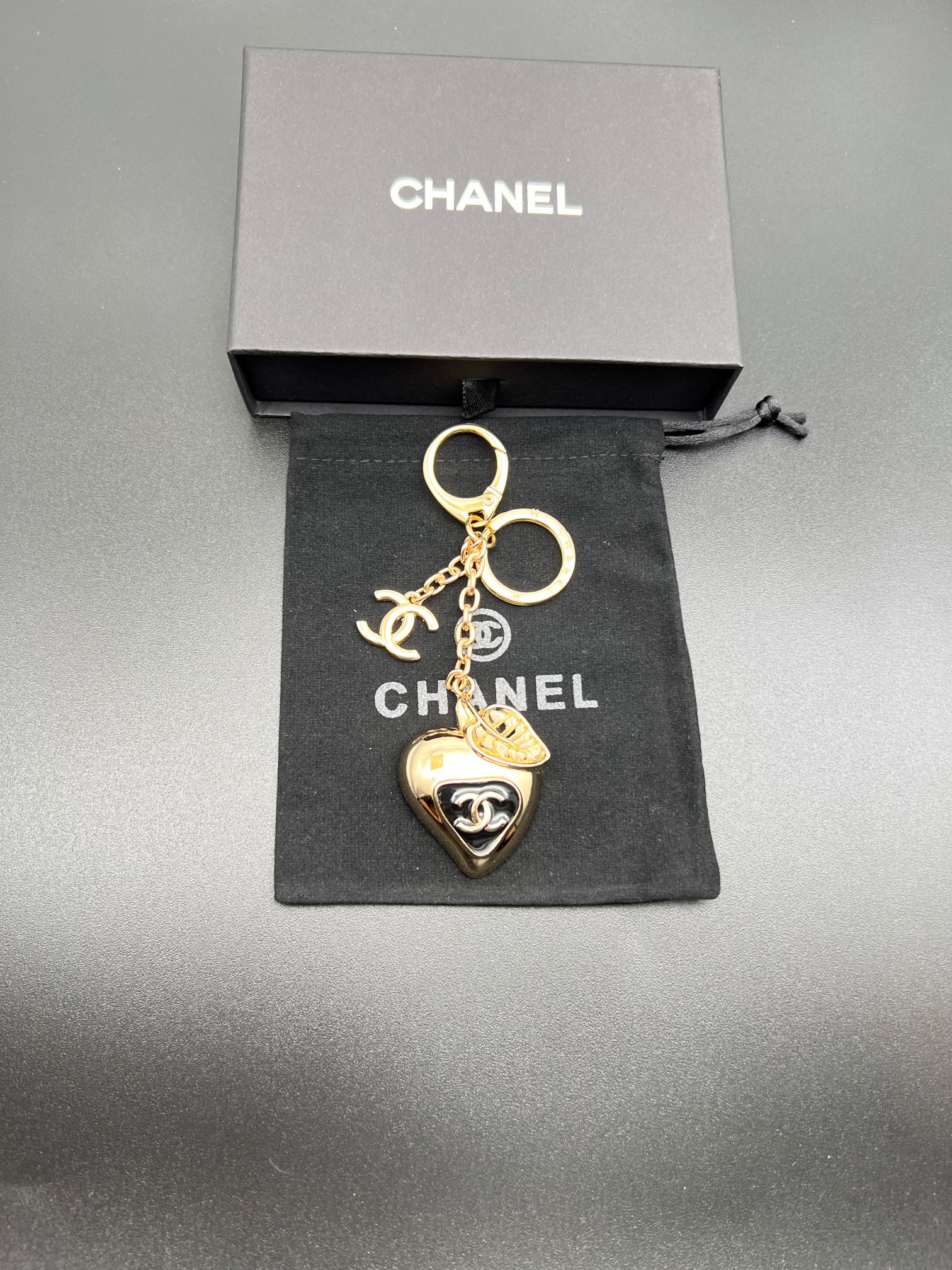 Chanel heart charm keychain, gold-toned heart pendant with chain