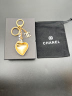 Chanel heart keychain, gold-toned heart charm with chain and key ring