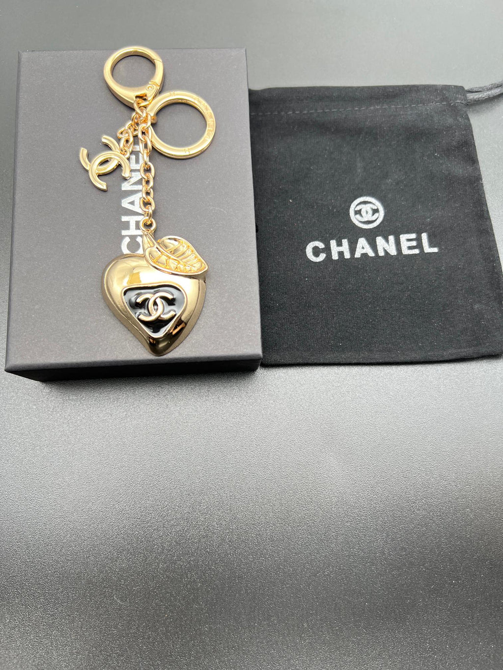 Chanel heart charm keychain with key ring, gold-toned heart pendant