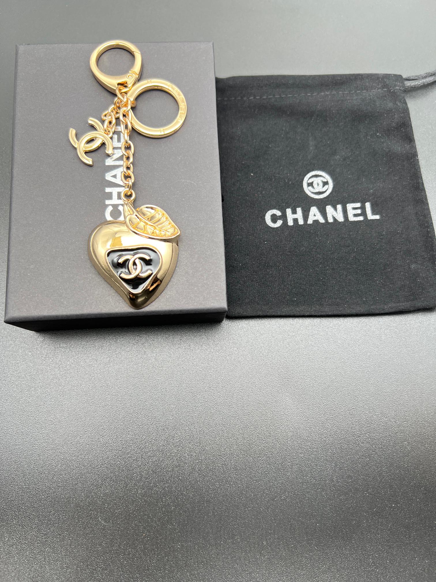 Chanel heart charm keychain with key ring, gold-toned heart pendant