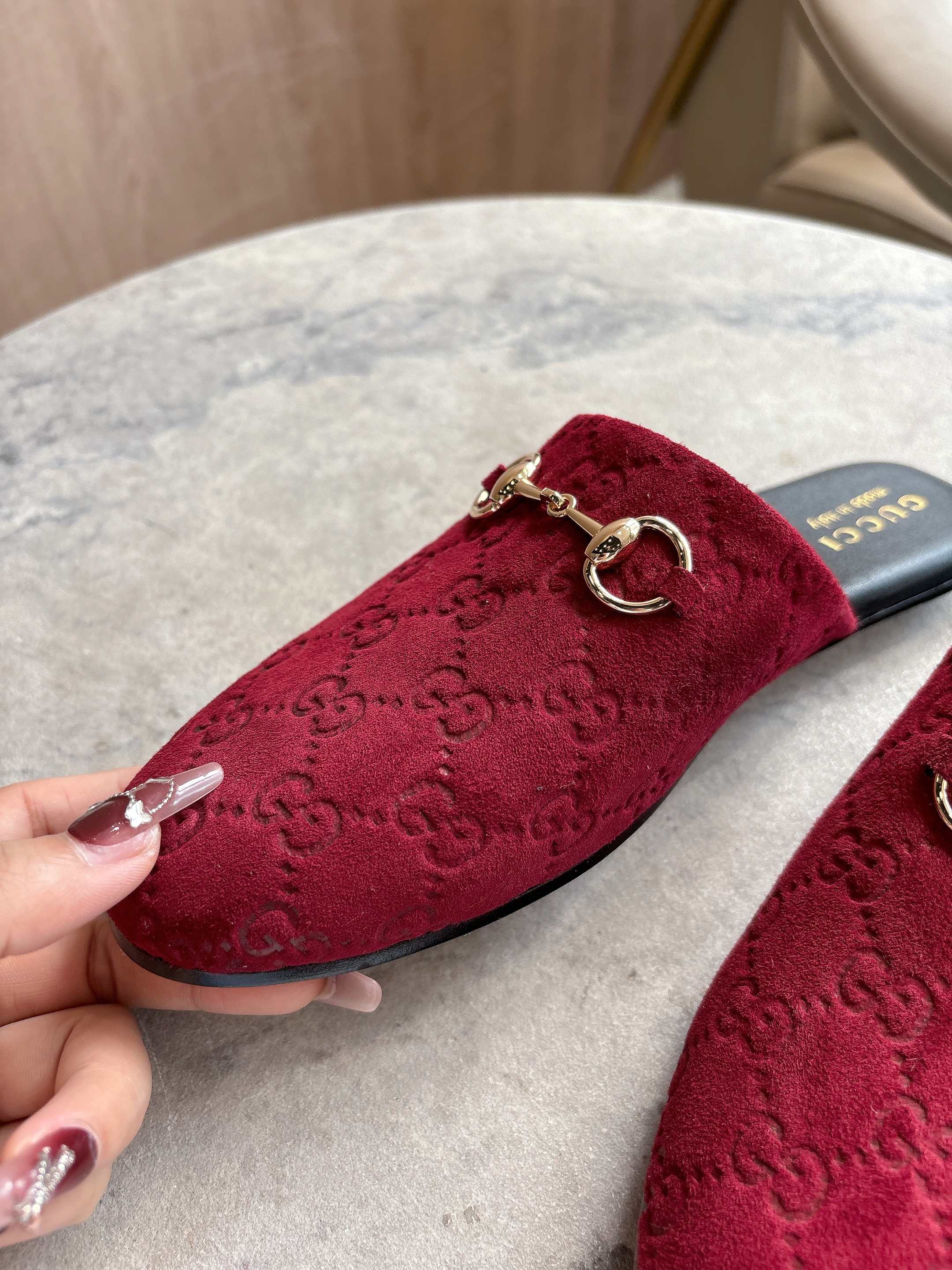 Gucci unisex horsebit mule, dark red GG-embossed velvet with gold ring and chain
