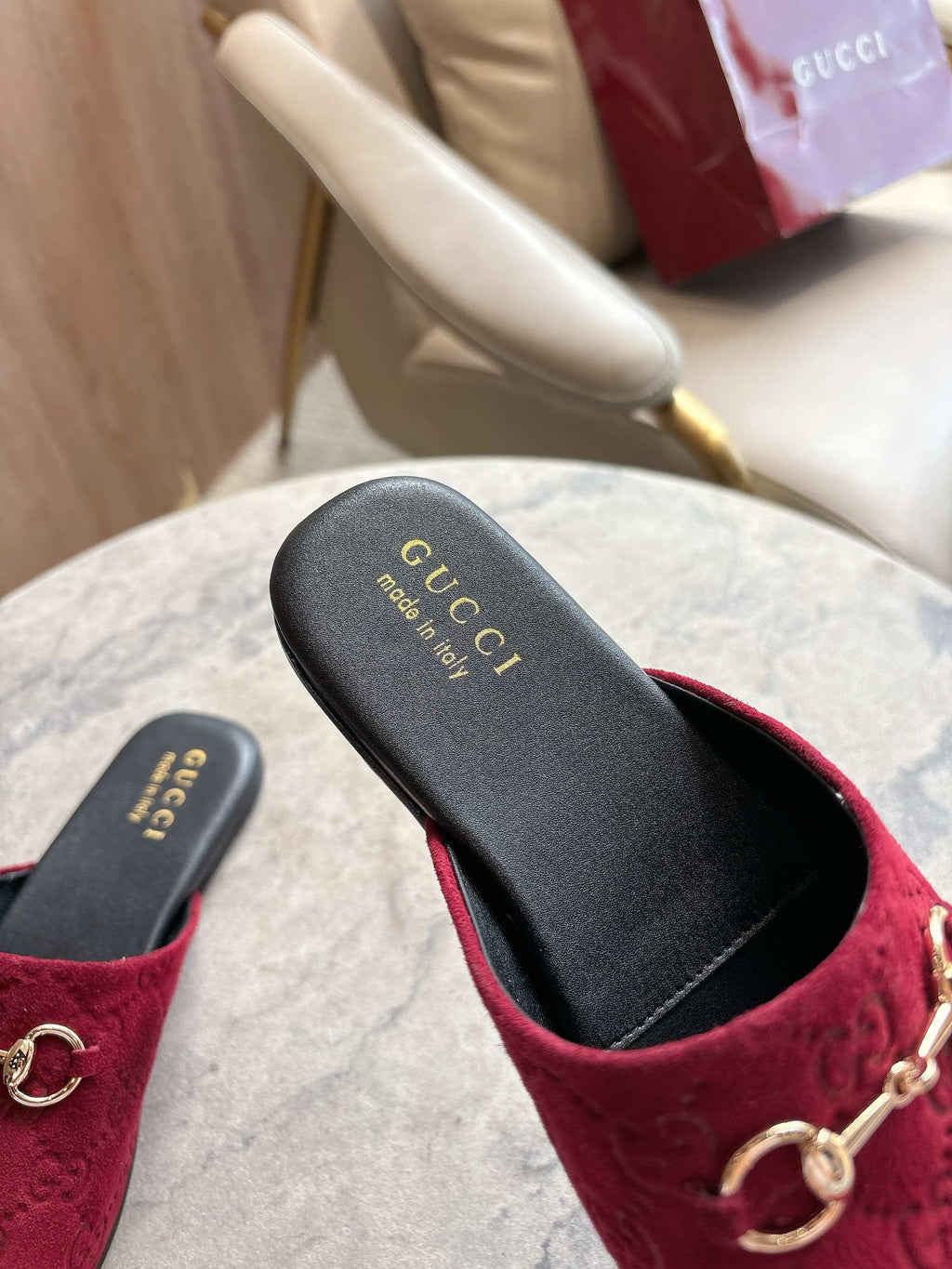 Gucci unisex horsebit mule, dark red GG-textured velvet with gold hardware and dark slide sole