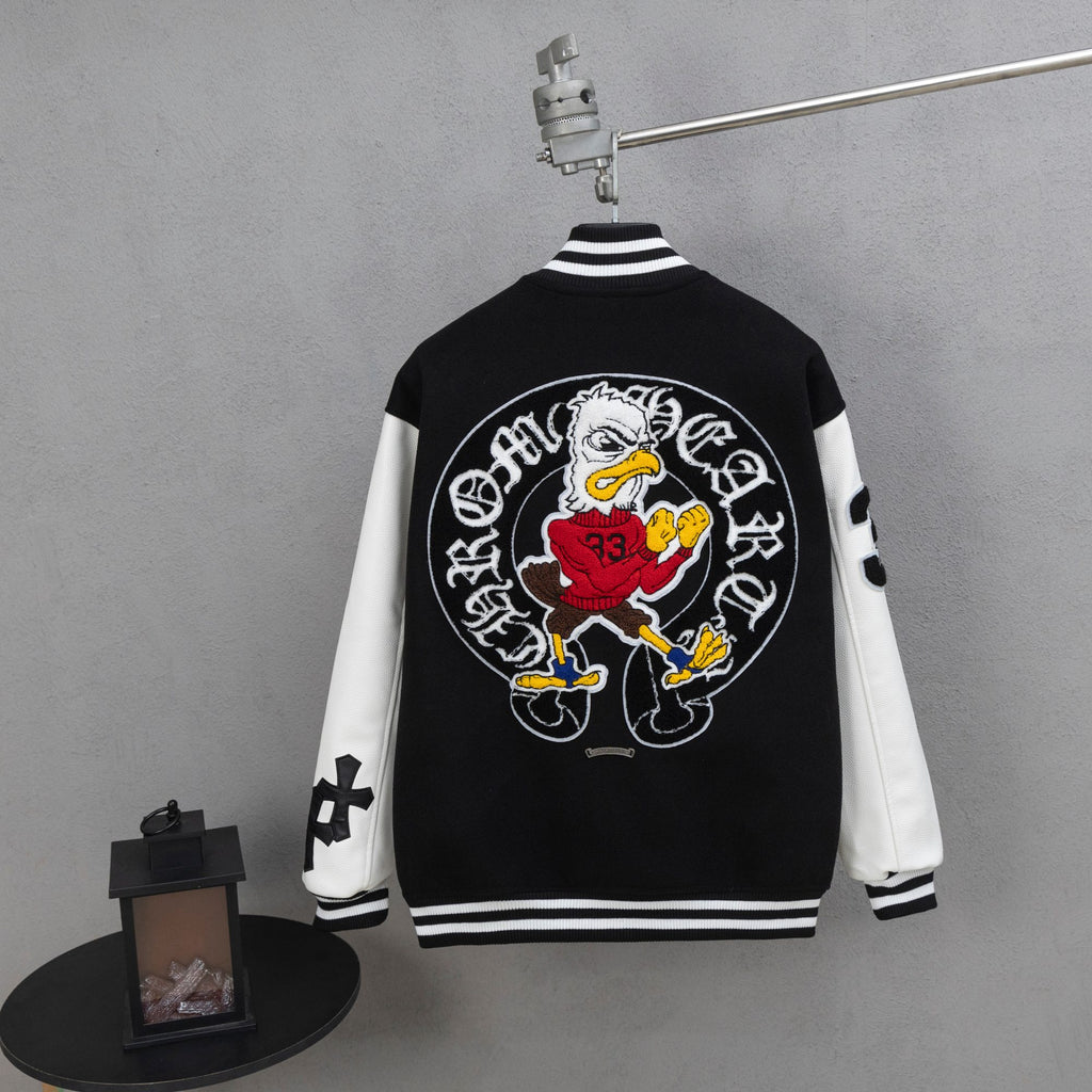 Back of black and white varsity jacket with large embroidered graphic