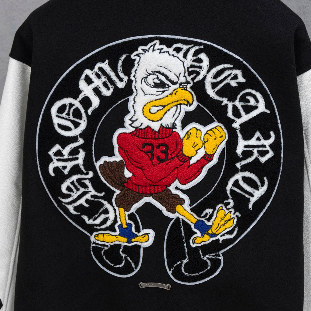 Black varsity jacket back graphic with cartoon eagle and colorful patch